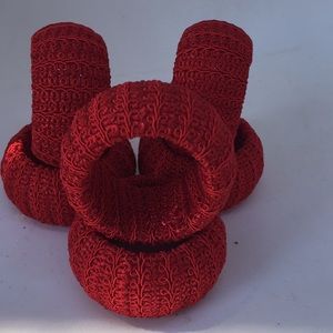 Six red knit napkin rings